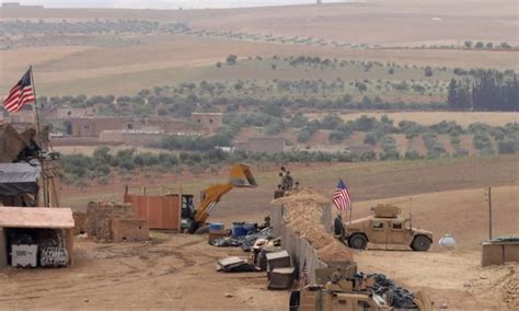 Drones attack a US military base in southern Syria and there are minor injuries, US officials say